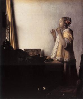 Johannes Vermeer : Woman with a Pearl Necklace